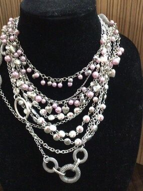 Lot of 4 necklaces. Includes a retired Premier Design , and Vintage Avon.